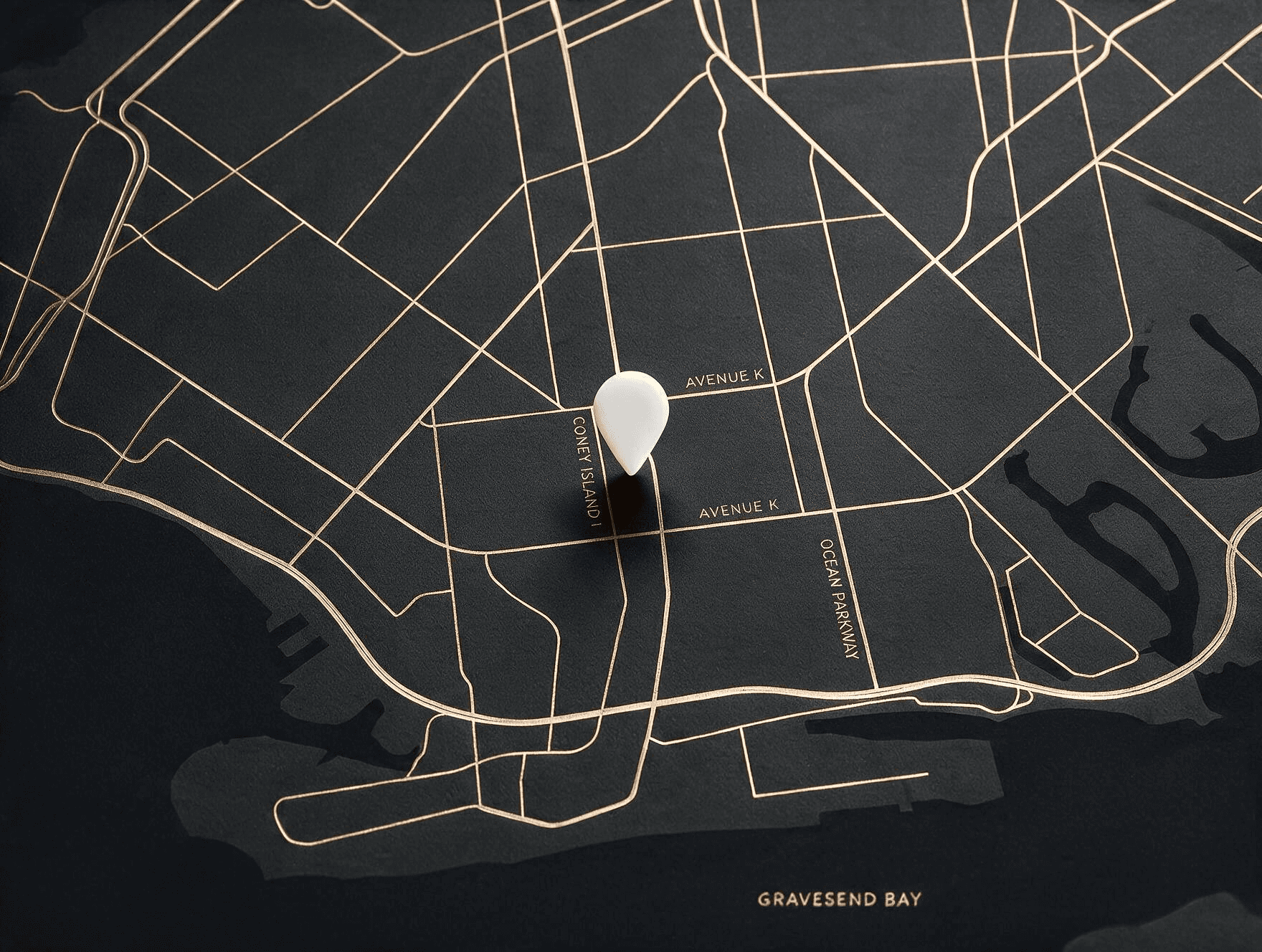 Stylized black-and-gold map of the Brooklyn neighborhood around 1122-A Coney Island Ave — Coney Island Avenue, Ocean Parkway and Gravesend Bay — marked with a cream location pin