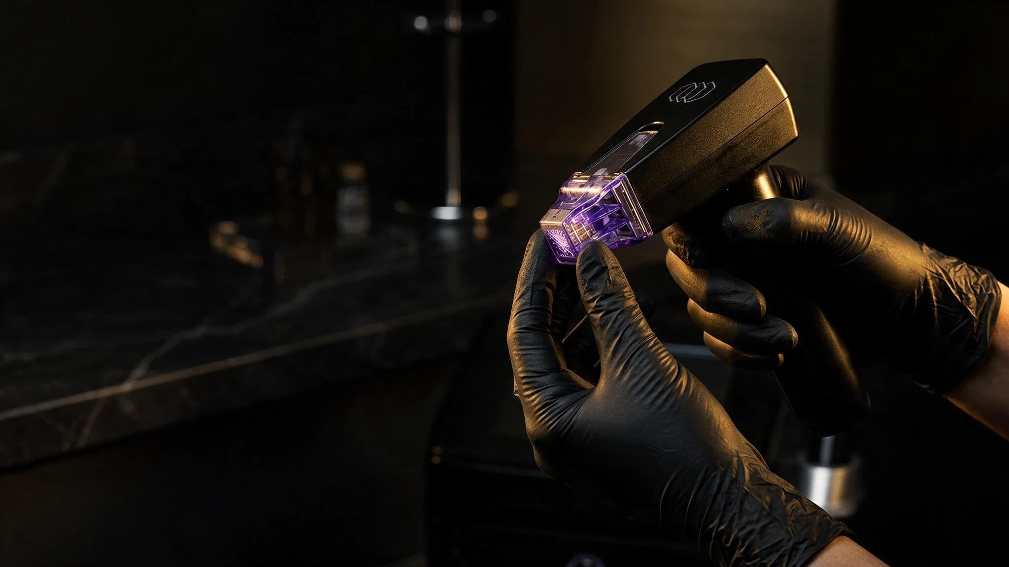 Gloved hands holding the Morpheus8 handpiece with its microneedling tip lit